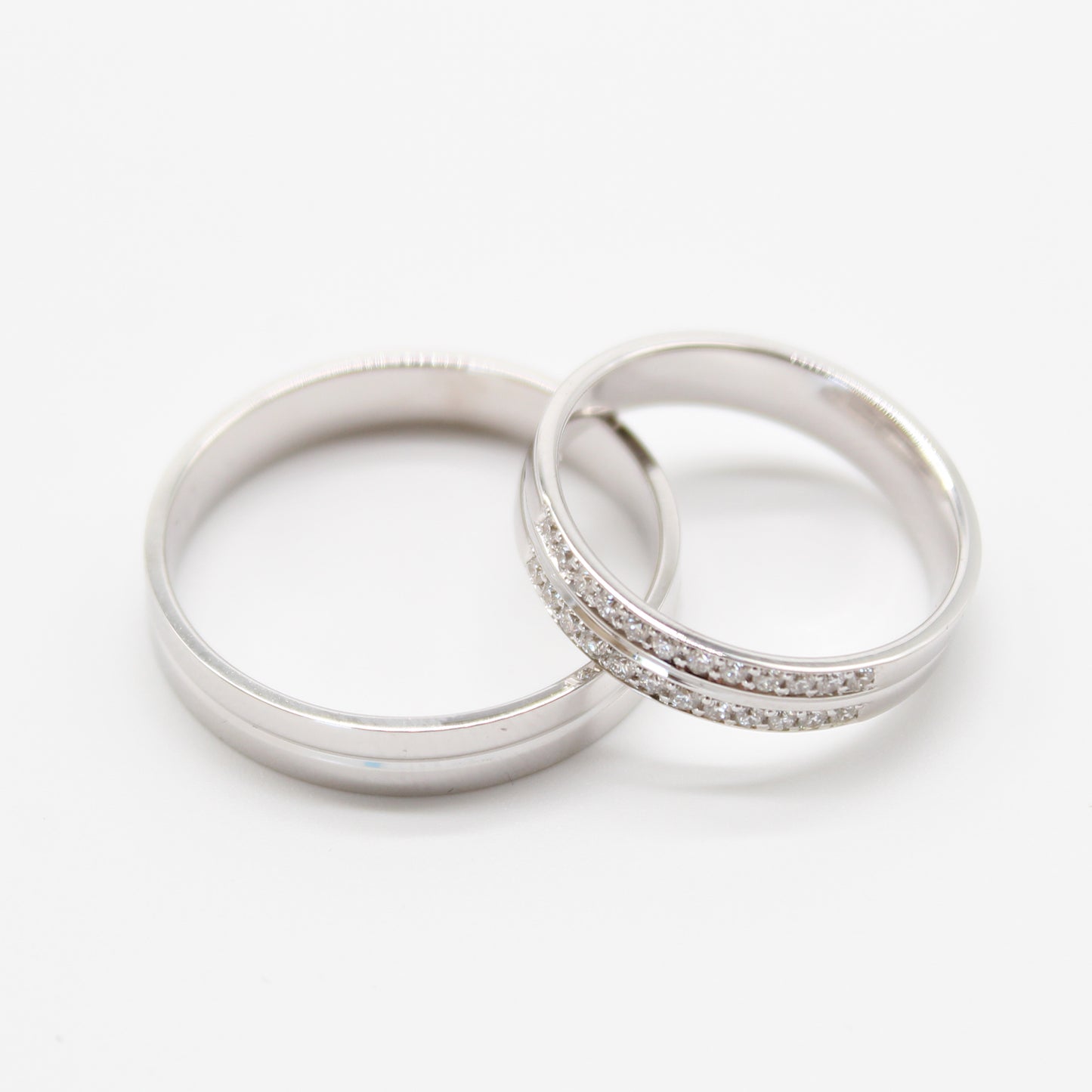 18k witgouden koppel trouwringen met 0,22ct diamanten