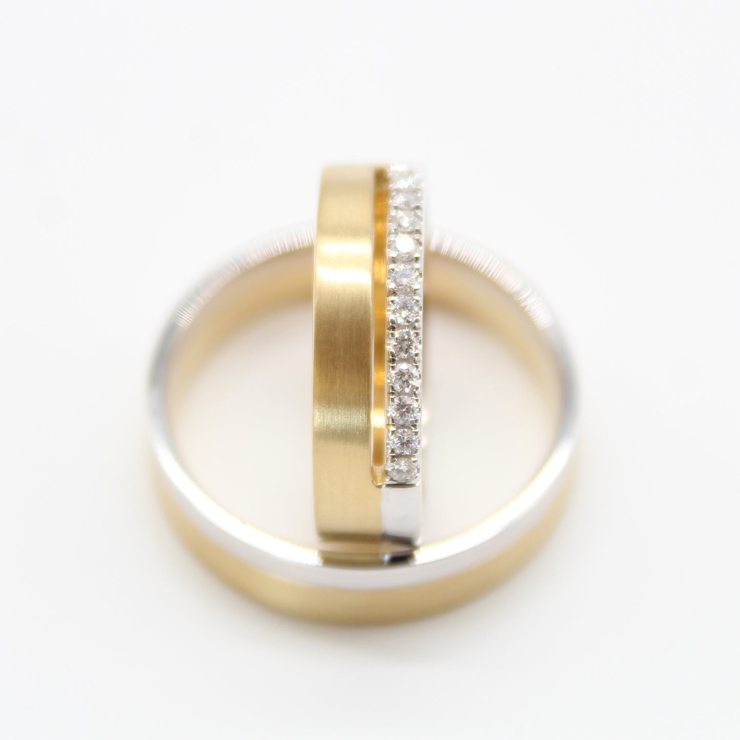 18k gouden koppel trouwringen met 0,14ct diamanten