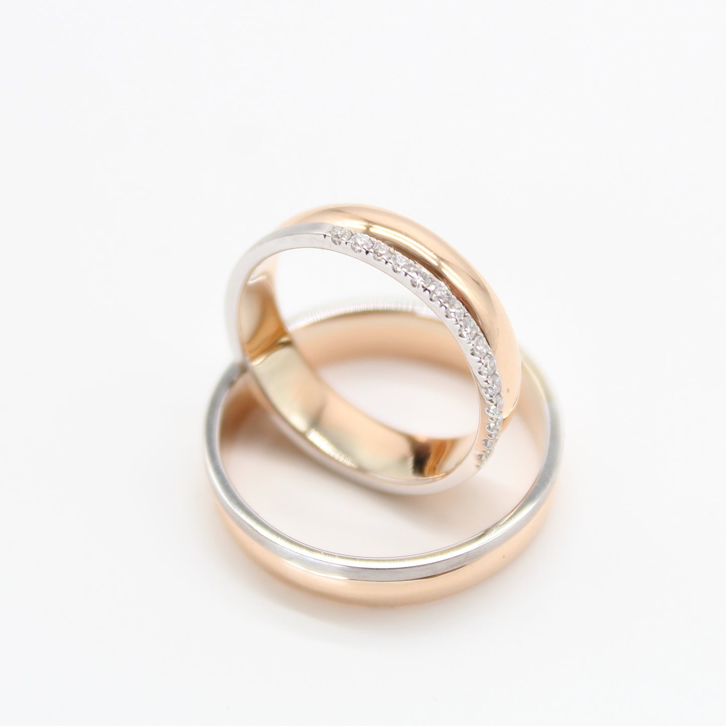 18k rosé goud koppel trouwringen met 0,15ct diamanten