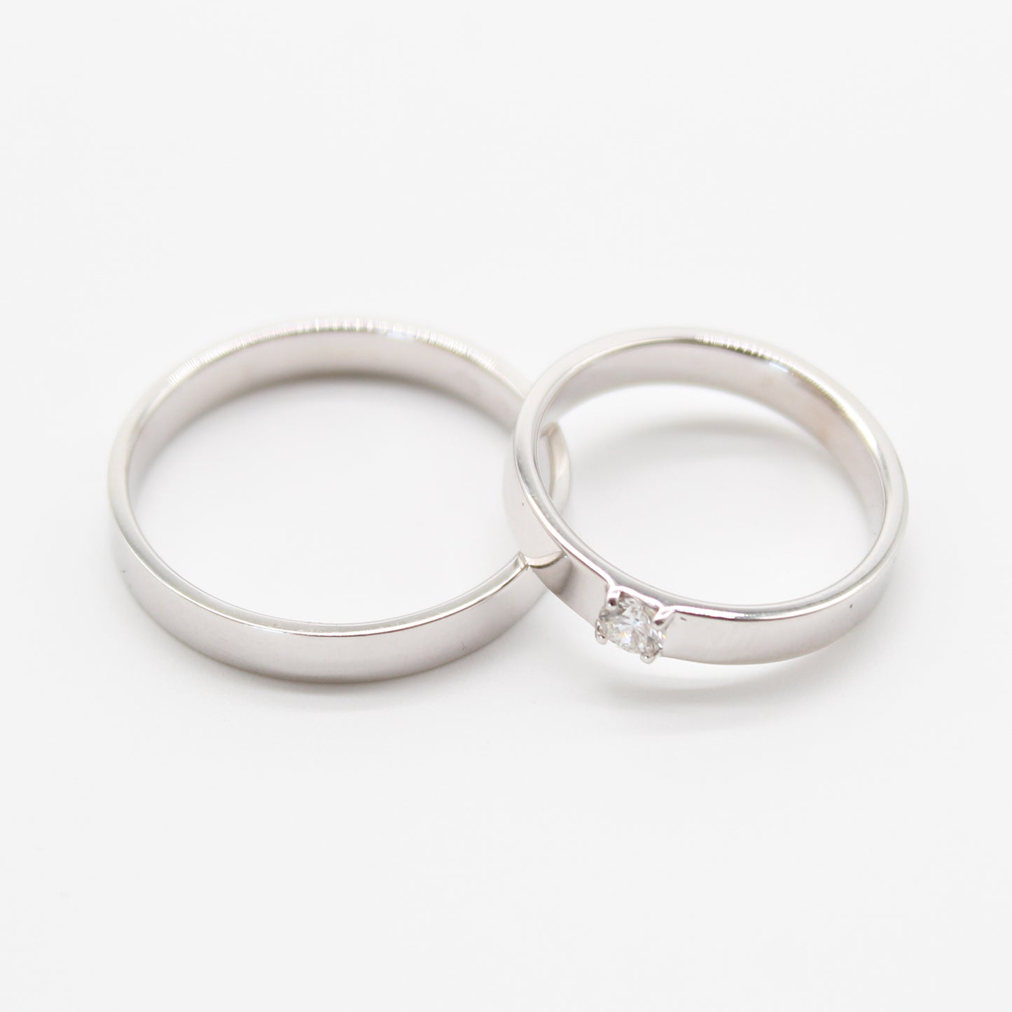 18k witgouden koppel trouwringen met 0,14ct diamant