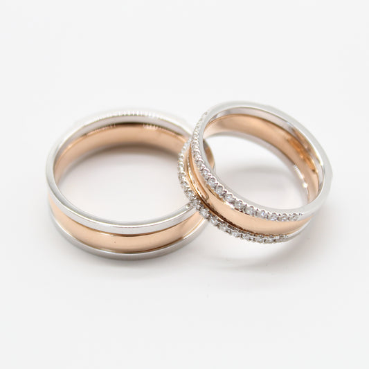 18k rosé gouden koppel trouwringen met 0,26ct diamanten