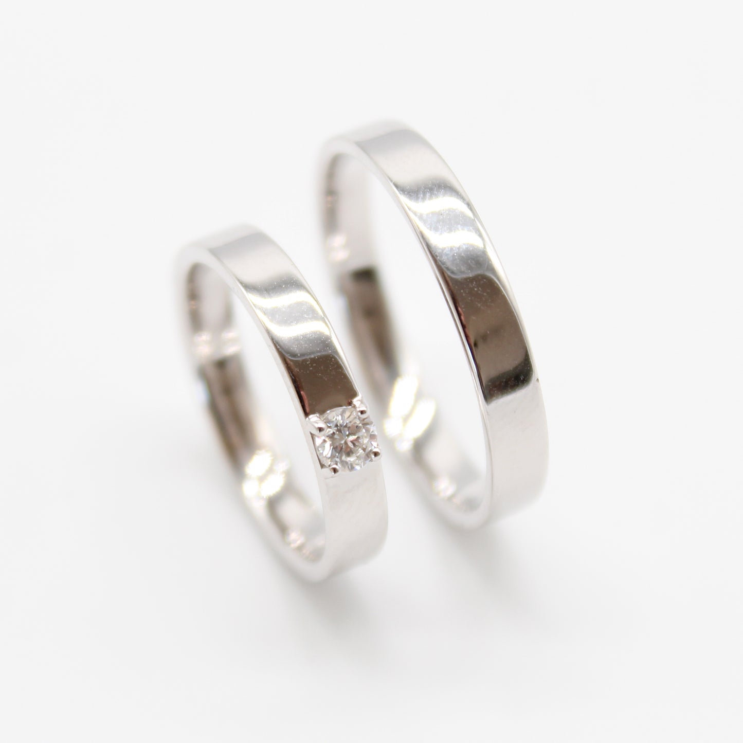 18k witgouden koppel trouwringen met 0,14ct diamant